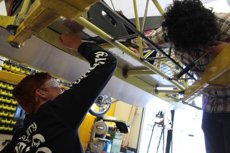 Students working under Electro Falcon.